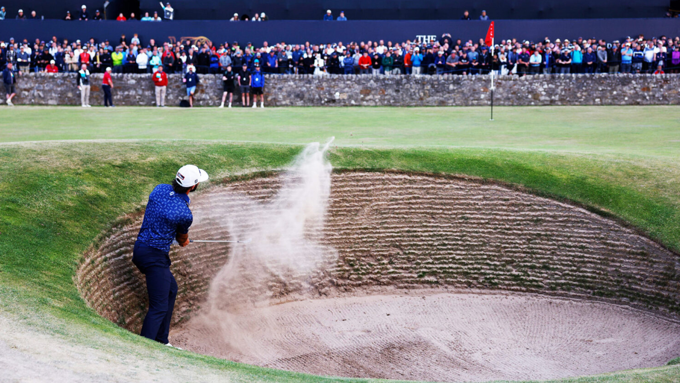 The small but deep Road Hole bunker cut into the 17th green at St Andrews