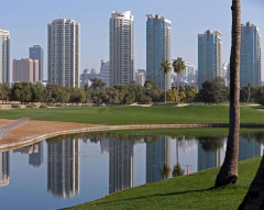 Lush green oasis-style fairway cut into desert