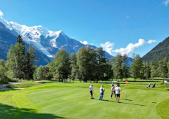 A fairway running through an alpine valley
