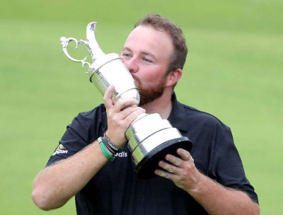 Shane Lowry lifting the Claret Jug at the 2019 Open at Royal Portrush