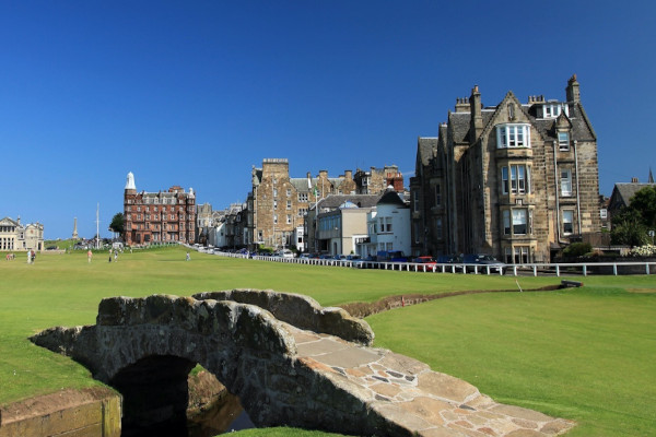 The Old Course at St Andrews with the Swilcan Bridge and the town behind
